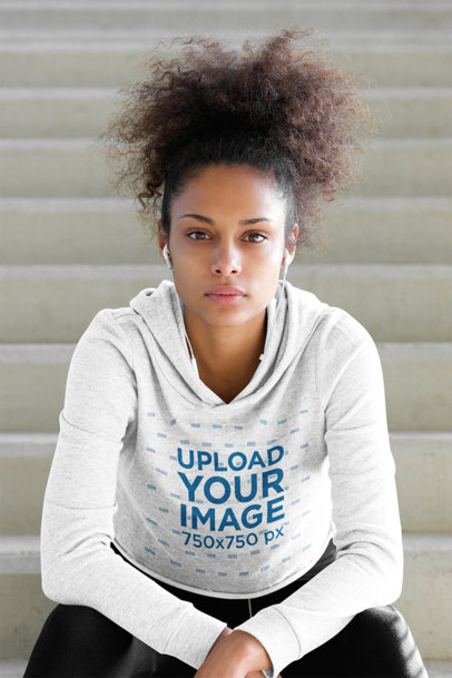 Mockup of a Serious Woman Wearing a Heathered Hoodie