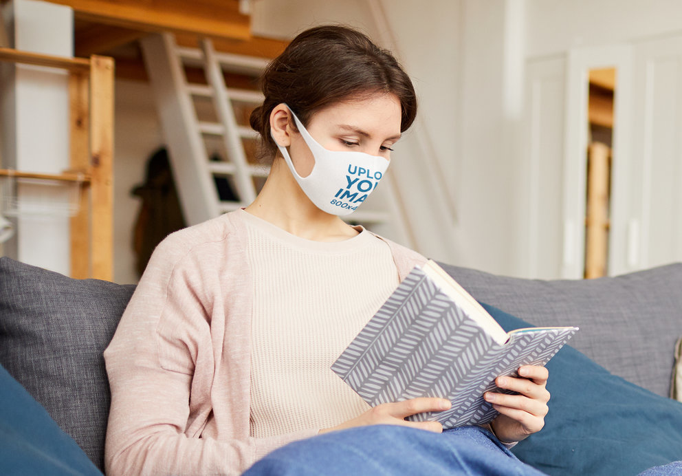 Face Mask Mockup of a Woman Reading at Home