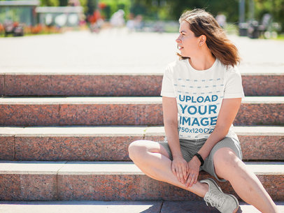 T-Shirt Mockup Featuring a Woman at a City Square m5774-r-el2