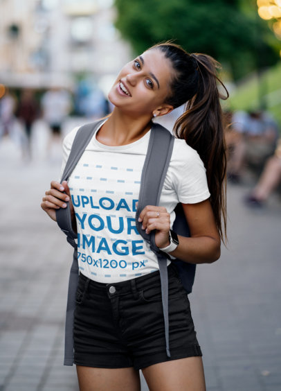 T-Shirt Mockup of a Joyful Student on the Street 45023-r-el2