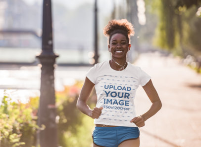 Activewear Tee Mockup of a Happy Woman Sprinting