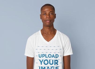 Mockup of a Man in a Plain Pose While Wearing a V-Neck Tee