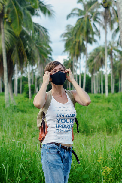 Tank Top Mockup of a Woman Posing Among Palm Trees M4599-r-el2