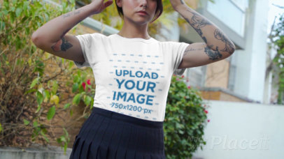 T-Shirt Video Featuring a Tattooed Woman Walking Down the Street
