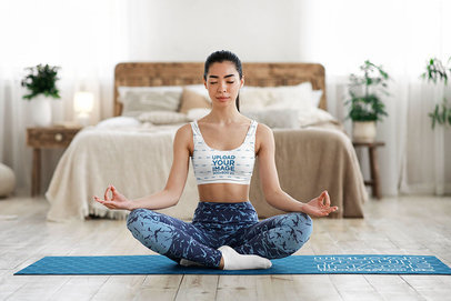 Yoga Mat Mockup Featuring a Woman Wearing a Sublimated Sports Bra