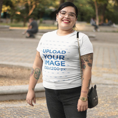 Smiling Plus Size Girl Wearing a Tshirt Template While at a Park a16008