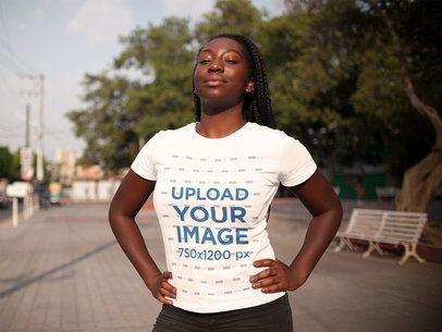 Mockup of a Young Woman with Locs Wearing a T-shirt While Under the Sun 15941