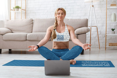 Sports Bra and Yoga Mat Mockup Featuring a Woman Meditating at Home