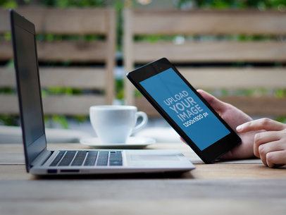 Mockup of a Woman Working with a Nexus 7 in Her Hand
