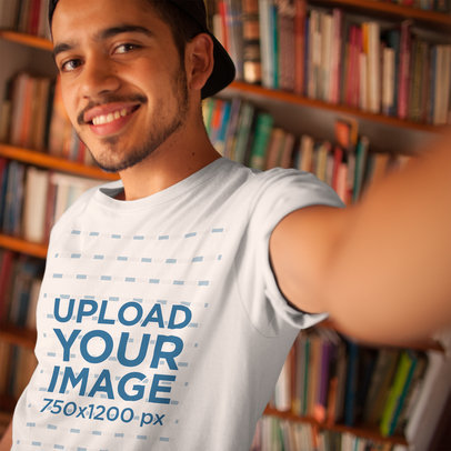 Selfie Mockup of a Young Dude Wearing a Round Neck Tee at a Library