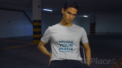 Basic T-Shirt Video Featuring a Man Posing in a Parking Lot 