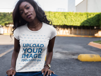 Beautiful Young Woman Wearing Tshirt Mockup While at a Parking Lot