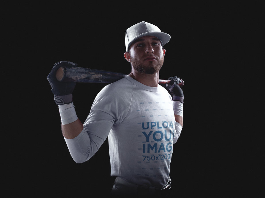 White Guy Wearing a Baseball Jersey Mockup While Standing with a Bat