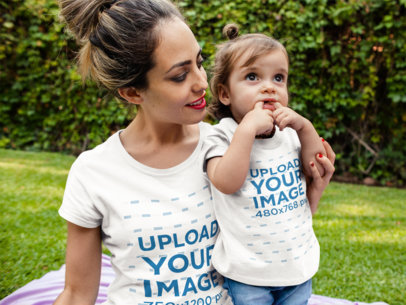 Mockup of a Mom and her Baby Girl Wearing Different Round Neck Tees Mockup While Outdoors