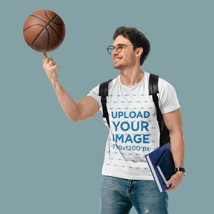 T-Shirt Mockup of a College Student Spinning a Basketball on His Finger