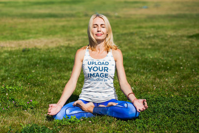 Tank Top Mockup of a Woman Meditating on the Grass