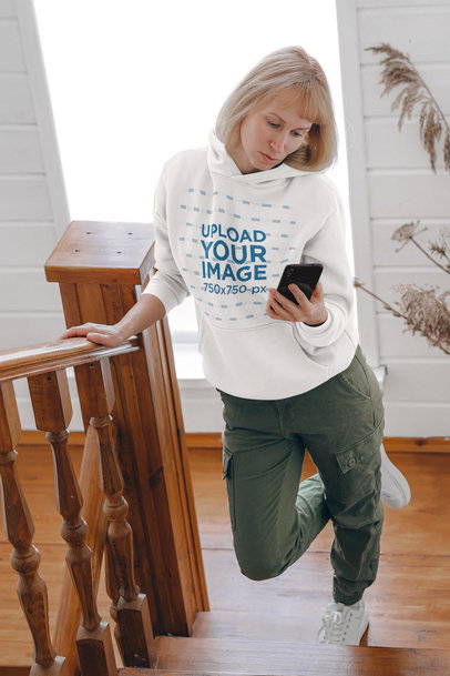 Hoodie Mockup of a Woman on a Wooden Staircase m5266-r-el2