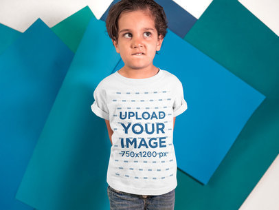 Little Kid Making Faces While Wearing a T-Shirt Mockup