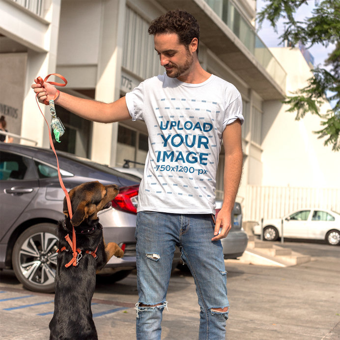 White Guy Playing with a Dog While Wearing a Round Neck T-Shirt Mockup