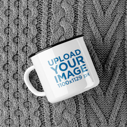 Mockup of a 12 oz Enamel Mug on a Wool Blanket