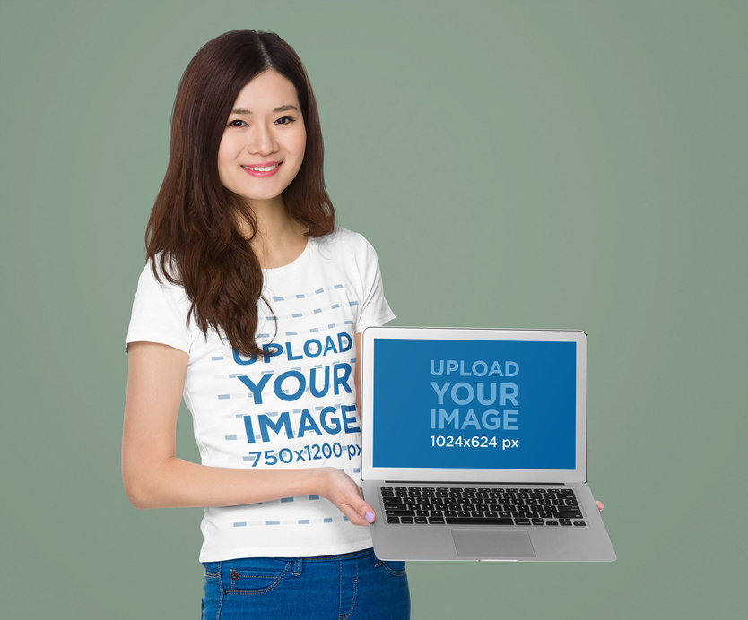 T-Shirt Mockup Featuring a Woman Holding a Macbook Air 