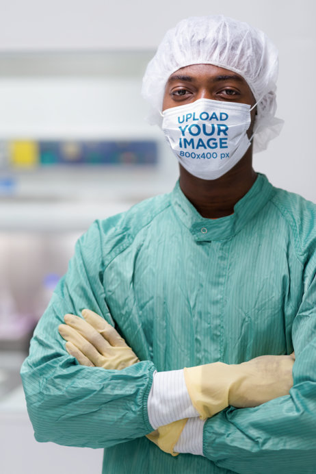 Face Mask Mockup of a Man Wearing Sterilized Garments