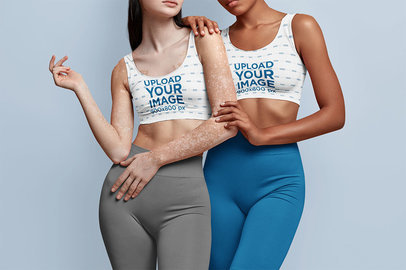 Sublimated Sports Bra Mockup Featuring Two Women at a Studio