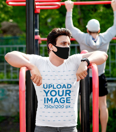 Mockup of a Man Exercising at an Outdoor Gym While Wearing a T-Shirt
