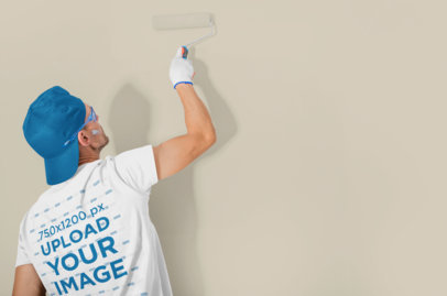 Back-View T-Shirt Mockup Featuring a Man Painting a Wall m5473 r-el2