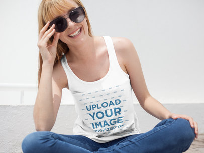 Happy White Woman Wearing Sunglasses and a Bella Canvas Tank Top Template Indoors