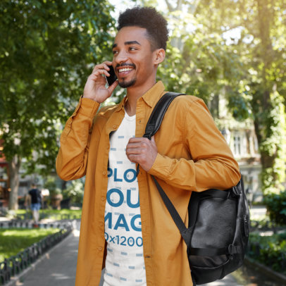 T-Shirt Mockup Featuring a Happy Bearded Man Making a Call