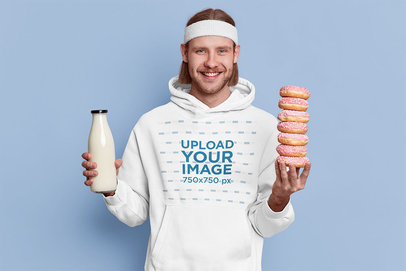 Hoodie Mockup of a Man Holding Some Milk and Donuts m3730-r-el2