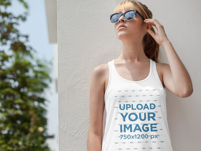 Beautiful Young Woman Wearing a Bella Canvas Tank Top Mockup While Looking to the Sky