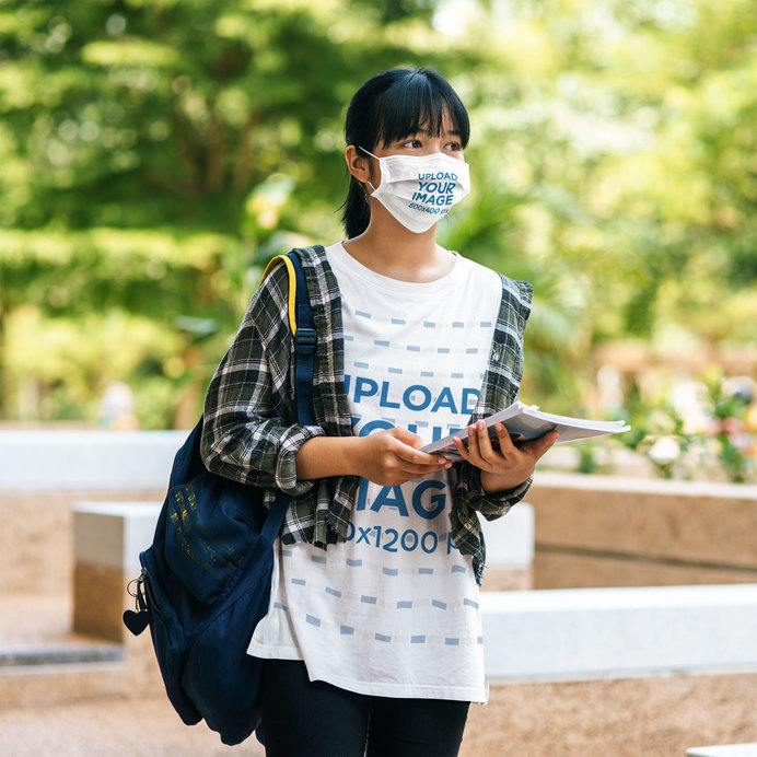 Face Mask Mockup of a Young Female Student Wearing an Oversized Tee