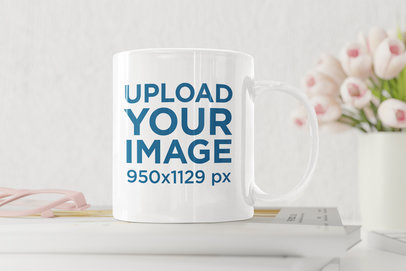 Mockup of an 11 oz Coffee Mug on a Neatly Decorated Desk m8954-r-el2