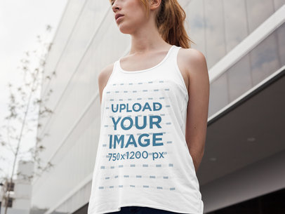 Mockup of a Bella Canvas Tank Being Worn by a Beautiful Woman While in the City