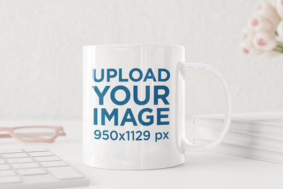 Mockup of an 11 oz Coffee Mug on a White-Colored Desk