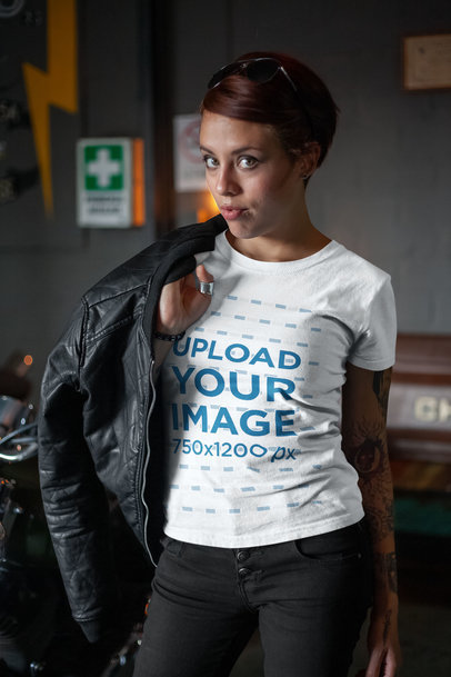 Mockup of a Biker Woman with a T-Shirt Putting a Leather Garment On
