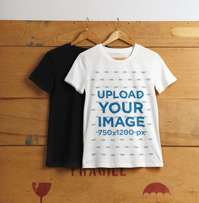 Mockup of a T-Shirt Placed on a Hanger Featuring a Cargo Box Background
