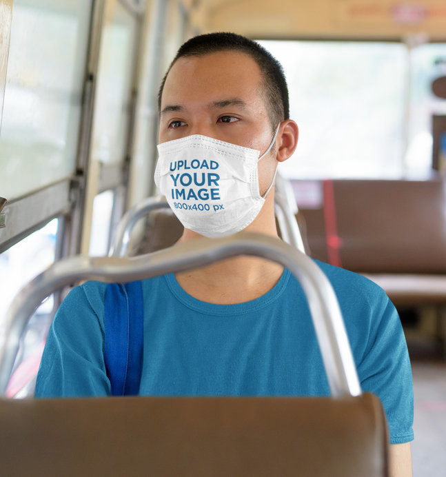 Mockup of a Man Wearing a Face Mask While Using Public Transportation