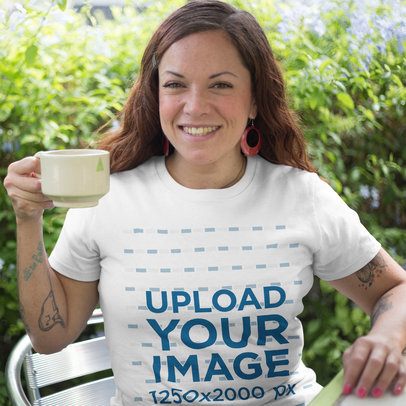 Mockup of a Happy Middle Aged Woman Wearing a T-Shirt While Having a Coffee in the Backyard
