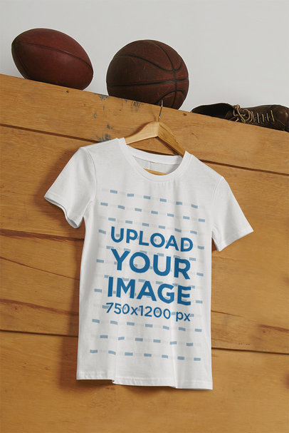 Mockup of a Round-Neck T-Shirt Hanging on a Wooden Box