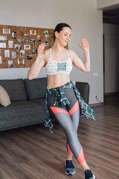 Sports Bra Mockup of a Woman Dancing at Home