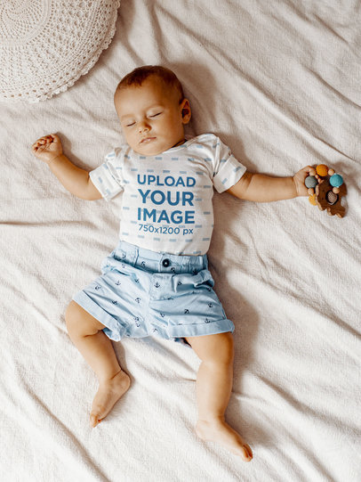 Onesie Mockup Featuring a Sleeping Baby Lying on a Bed m5182-r-el2