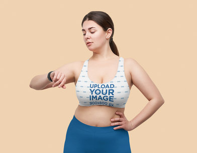 Sports Bra Mockup Featuring a Woman Checking Her Watch m8265-r-el2