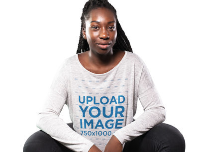 Young Woman With Locks Sitting Down While Wearing a Long Sleeve Slouchy T-Shirt Mockup