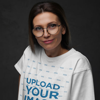 T-Shirt Mockup Featuring a Smiling Woman Wearing Rounded Glasses m9781 r-el2