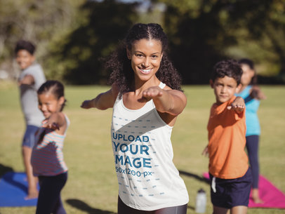 Tank Top Mockup of a Female Yoga Teacher at the Park