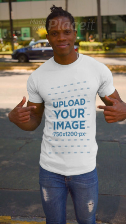 Video of a Man Showcasing His T-Shirt on the Street