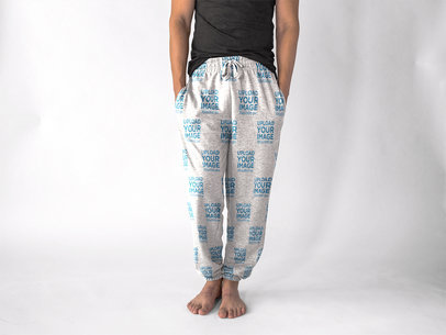 Man Wearing Sweatpants Mockup While Standing Against a White Surface